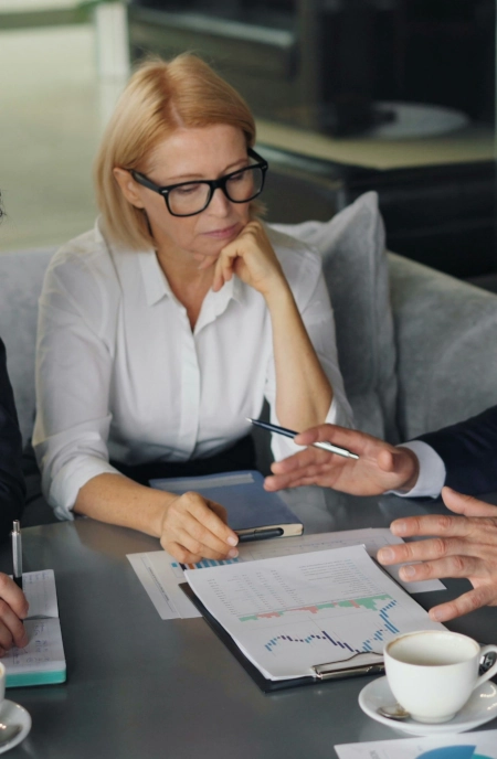 Coaching client at desk